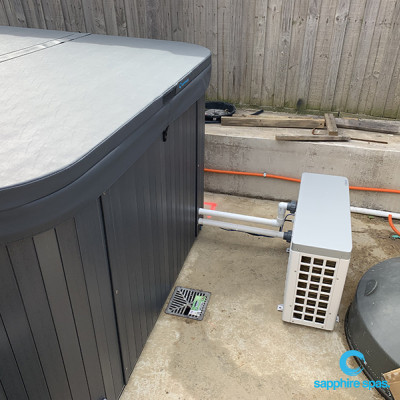 heat and cool pump installed close to myWorkout4.5m swim spa for optimum heating efficiency thanks to the team at mySpaPakenham