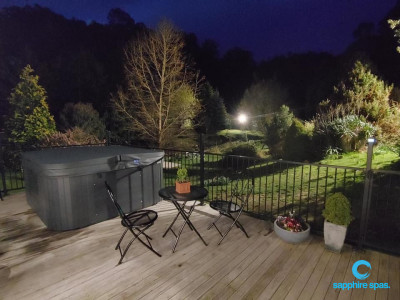 Spa pool ready to use in grey duratek cabinet snuggled up with a slate grey hardcover thanks to the team @ Poolquip Hobart