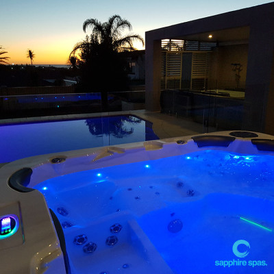 Spa pool overlooking this backyard swimming pool thanks to the team @ West Coast Spas Perth