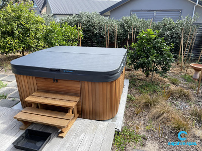 Spa pool dressed in western red cedar timber cabinet thanks to the team @Paramount Pools Tauranga NZ