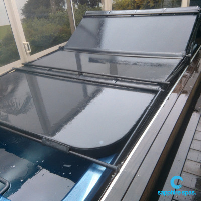 4metre hardcover shown on mySwimgym - this roller system was designed by one of our spa owners - they joined the cover sections together to incorporate with the roller system