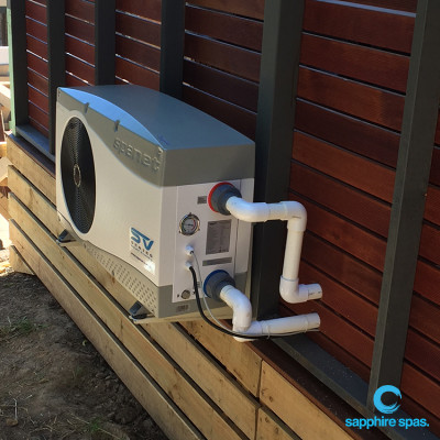 Heat pump installed & hidden on other side of fence as deck was tight for space