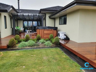 cedar cabinet with heat pump installation : thanks to the team at Paramount Pools ChCh