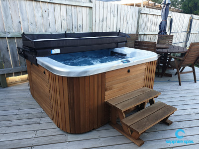 Cosy spa pool on a deck thanks to the Swimming Pool Shop in Hamilton & Cambridge NZ