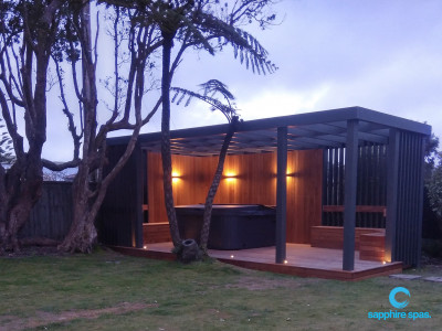 Spa pool surrounded by a spectacular deck thanks to the team at Wrights Pool & Spa NZ
