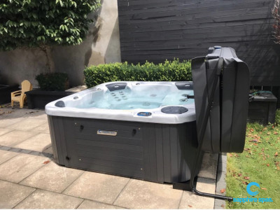 Thanks to the team @ Spa Pools Otago : cosmic swirl spa & grey duratek cabinet works well with black stained timber backdrop & overhanging greenery