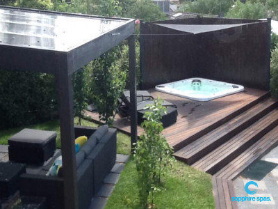 Spa pool in deck with shade sail installed by mySpaSYDNEY