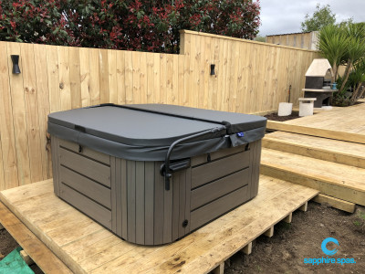 This coastal grey duratek cabinet is highlighted by the rich cypress timber backdrop thanks to the team @ Paramount Pools & Spas Tauranga NZ