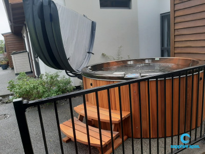 myHotTub sits neatly into this smaller backyard space thanks to the team @ Wright Pools @ Spas NZ