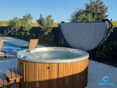 myHotTub sits warmly beside this inground swimming pool for Mum & Dad to watch the kids : installed by the team @ Wright Pools & Spas NZ